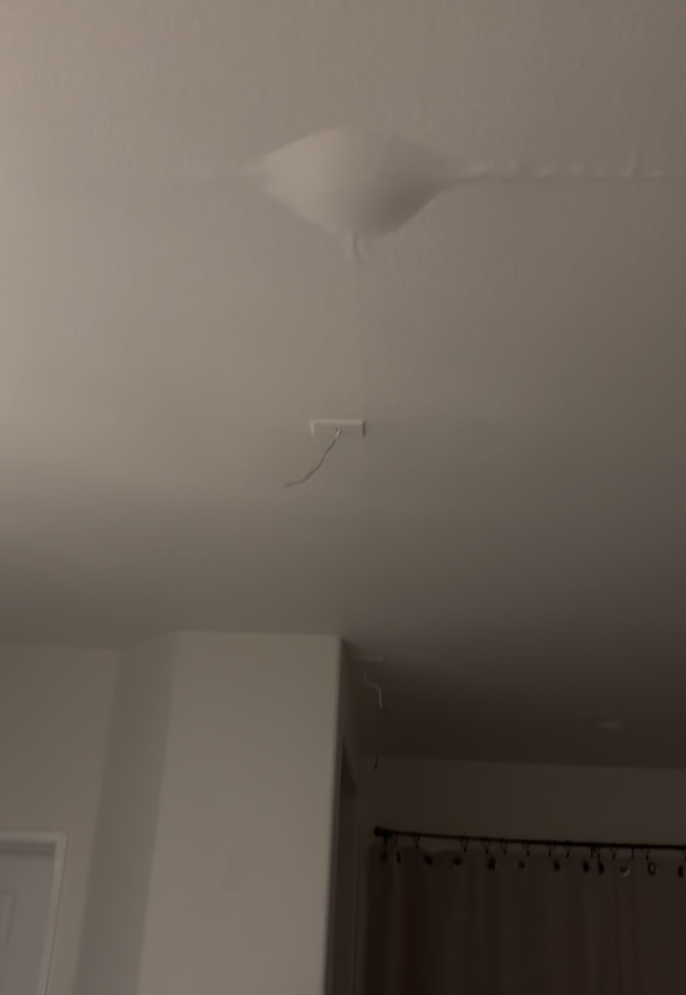 Kitchen ceiling with water damage bump